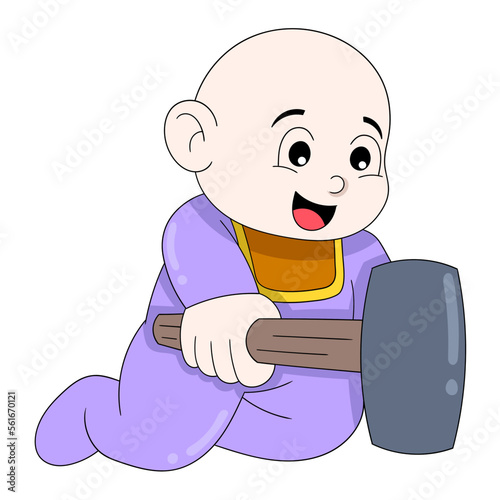 baby boy is acting funny carrying a hammer hitting