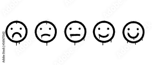 Spray Painted Graffiti Feedback in form of emotions Sprayed isolated with a white background. graffiti Customer feedback. Excellent, good, normal, bad, awful with over spray in black over white.