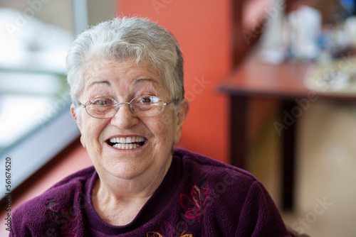 Close up portrait of elderly woman in retirement home.