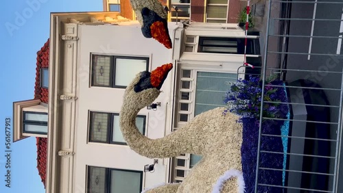 Platforms decorated with flowers on Bloemencorso Bollenstreek Flower Parade Keukenhof, Haarlem, the Netherlands, 24 April 2022 Vertical video. High quality 4k footage photo