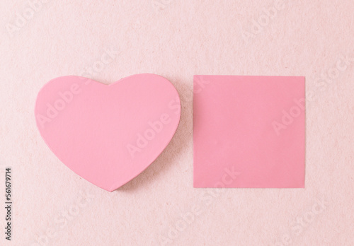 One heart gift box on a pink background.