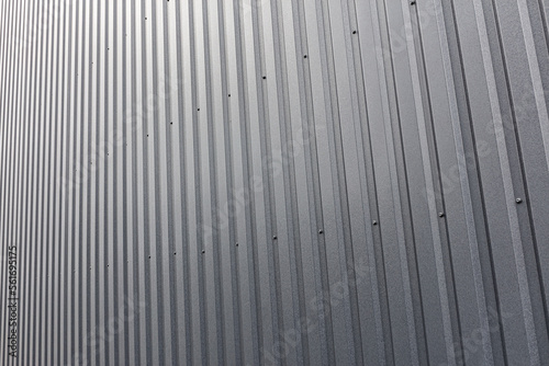 gray corrugated metal sheet background. industrial building wall.