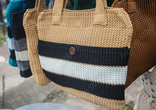 Handmade knitted bags produced by small home industries are souvenirs for tourists at the Mount Tangkuban Parahu tourist spot in Bandung, Indonesia. Sold in stalls around the crater. photo