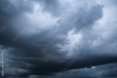 White and grey clouds scenic nature environment background. Storm clouds floating in a rainy day with natural light. Cloudscape scenery, overcast weather above blue sky.