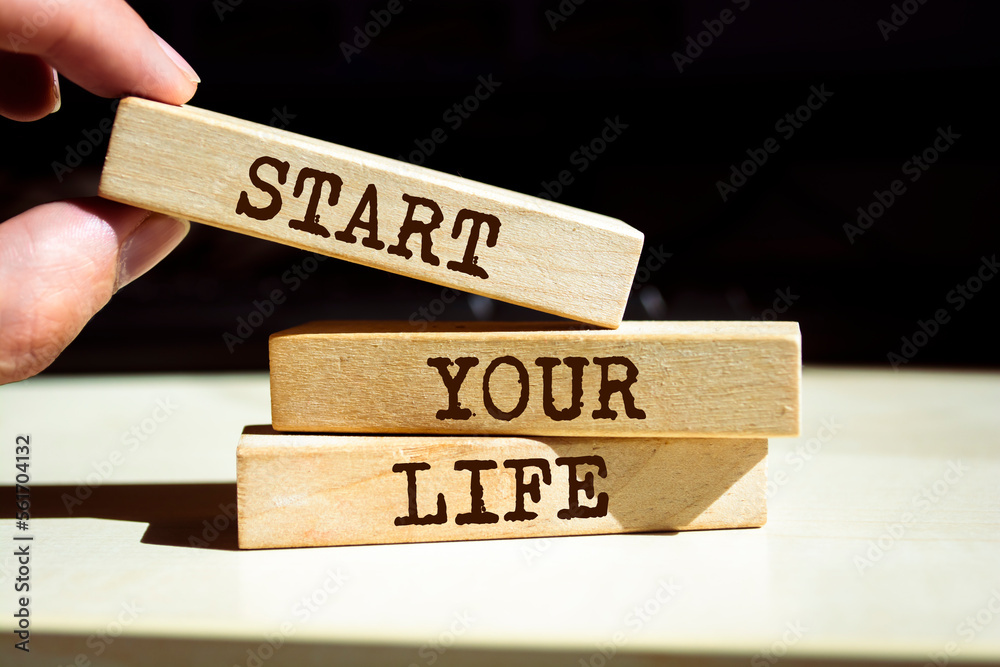 Wooden blocks with words 'Start Your Life'. Wooden blocks with words 'Start Your Life'.