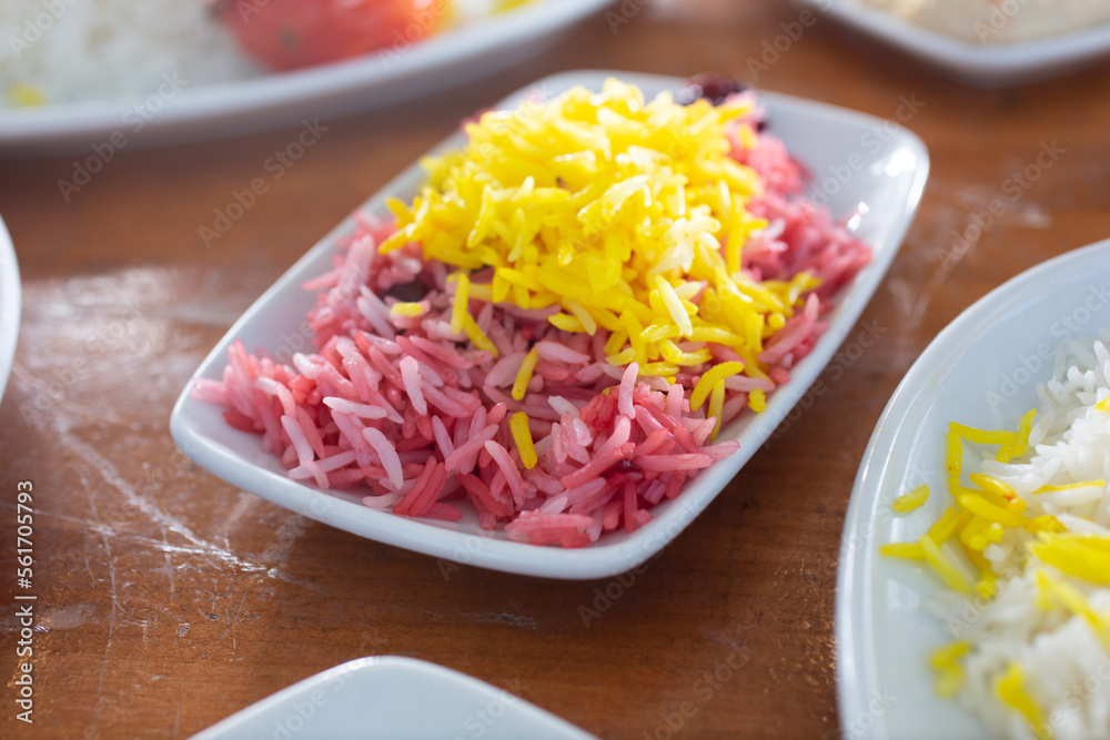 A view of a plate of Persian cherry rice. A view of a plate of Persian cherry rice.