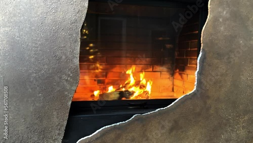 flame behind the protective glass of a fireplace