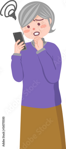 スマホを持って困っているシニア女性