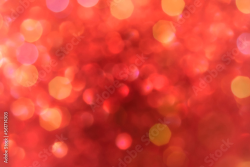 Bokeh or red blur. Abstraction with bright balls. Texture of red color