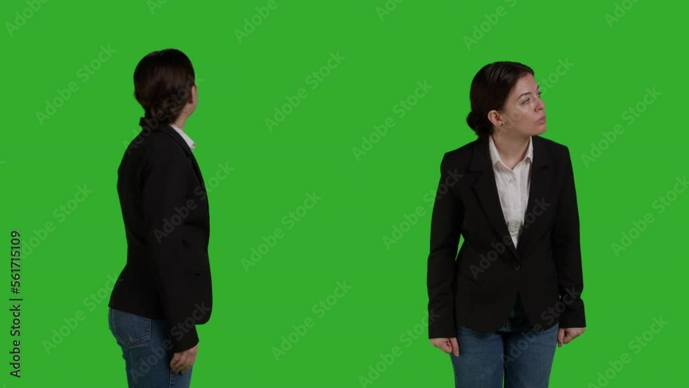 Close up of caucasian worker with office suit standing over greenscreen background, waiting in studio. Corporate employee looking stylish and acting confident on camera, company manager. Close up of caucasian worker with office suit standing over greenscreen background, waiting in studio. Corporate employee looking stylish and acting confident on camera, company manager.