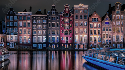 Amsterdam canals in the evening light, Dutch canals in Amsterdam Holland Netherlands during winter time in the Netherlands. Europe photo