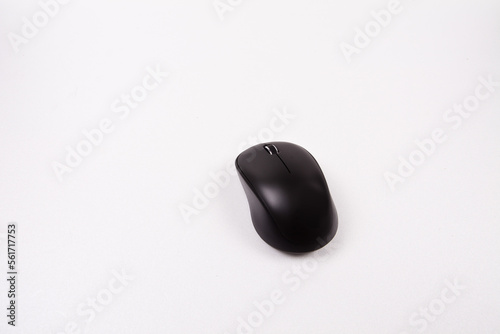 Black wireless mouse with path on white background