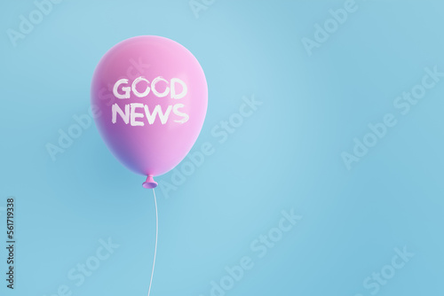 Foto Pink flying air helium balloon with the announcement message GOOD NEWS
