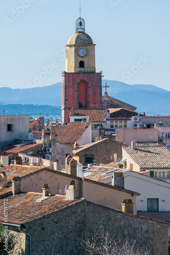 Saint Tropez church tower with clock against blue sky © Donatas