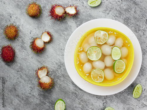 manisan rambutan or food made from processed rambutan. sweet and fresh with lime photo