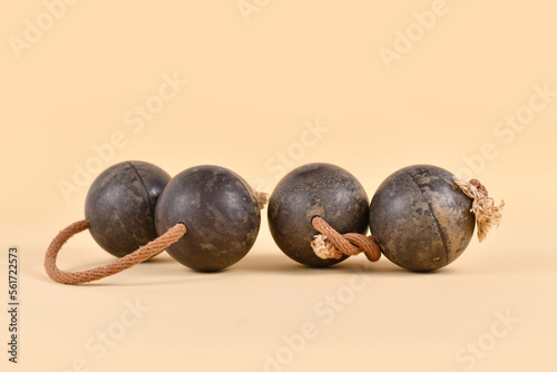 Traditional African hand percussion musical ball shaker instrument called 'Kashaka' photo