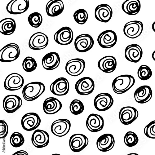 Hand drawn ink doodle simple pattern. Round elements. Monochrome colors. Expressive seamless abstract background in black and white. Trendy brush marks. Vector illustration