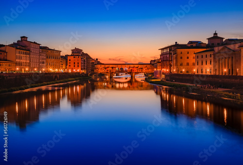 Famous Ponte Vecchio bridge on the river Arno River at sunset, Florence, Italy