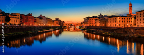 Famous Ponte Vecchio bridge and Palazzo Vecchio at sunset, Florence, Italy