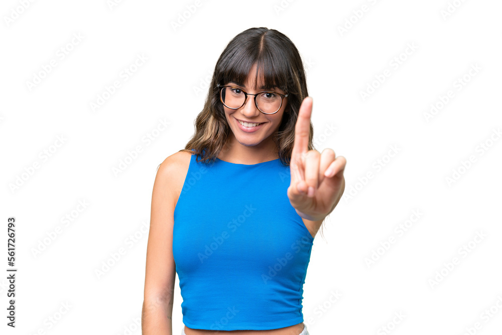 Young caucasian woman over isolated background showing and lifting a finger
