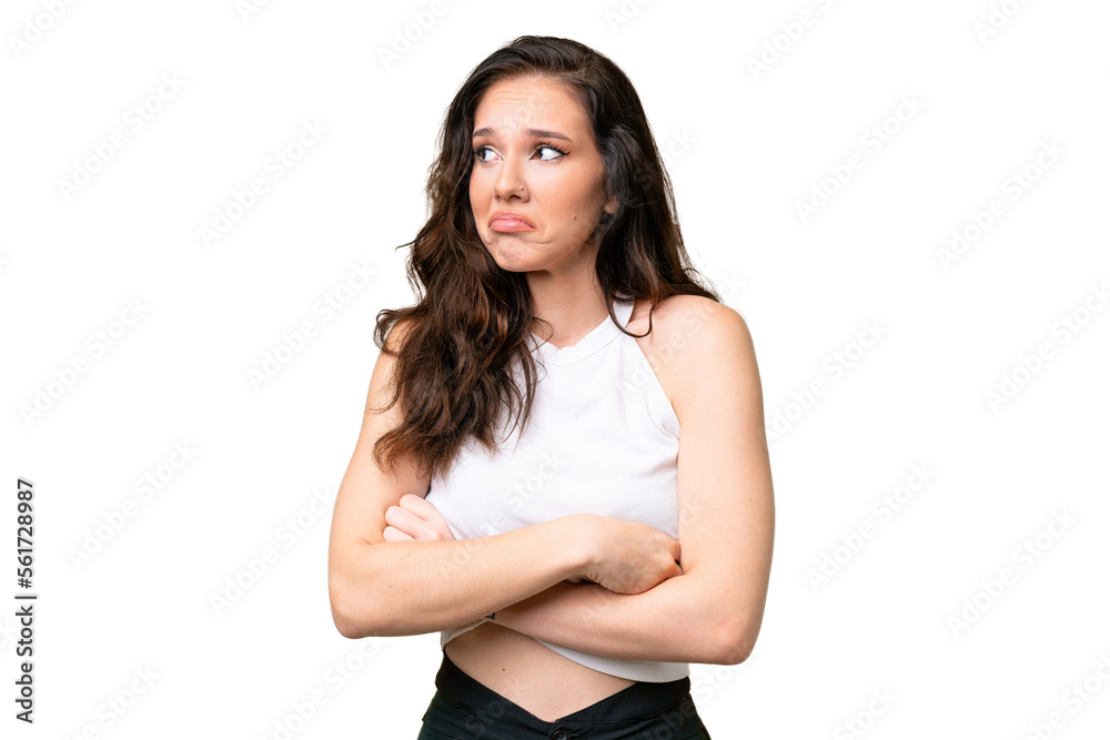 Young caucasian woman isolated over isolated background making doubts gesture while lifting the shoulders Young caucasian woman isolated over isolated background making doubts gesture while lifting the shoulders