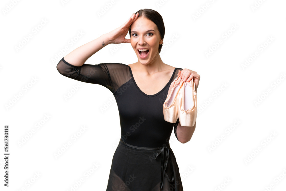 Young caucasian woman practicing ballet over isolated background with surprise expression Young caucasian woman practicing ballet over isolated background with surprise expression
