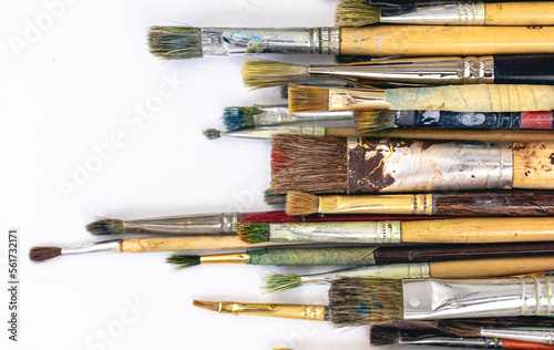 Close-up, brushes for drawing on a white background.