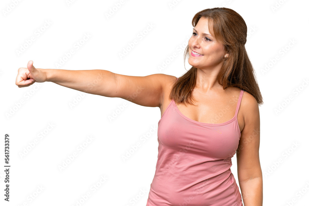Middle-aged caucasian woman over isolated background giving a thumbs up gesture Middle-aged caucasian woman over isolated background giving a thumbs up gesture