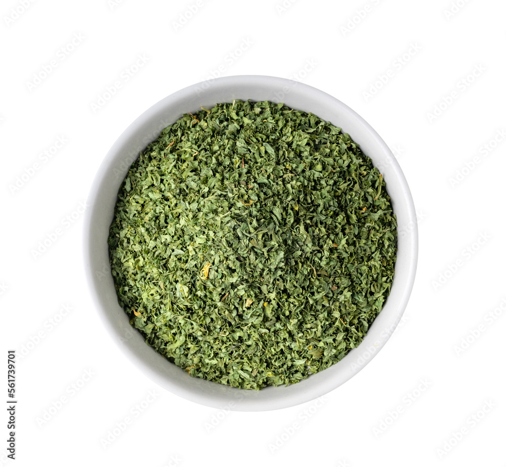 Dried parsley in a white bowl on transparent png Dried parsley in a white bowl on transparent png