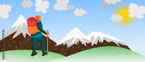 Un hombre montañista de excursión en un paisaje de montaña durante el invierno