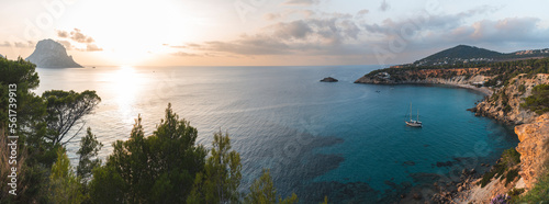Spain, Balearic Islands, Coastline of Ibiza island at sunset photo