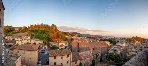 Italy, Lazio, Bolsena, Panoramic view of town at dusk