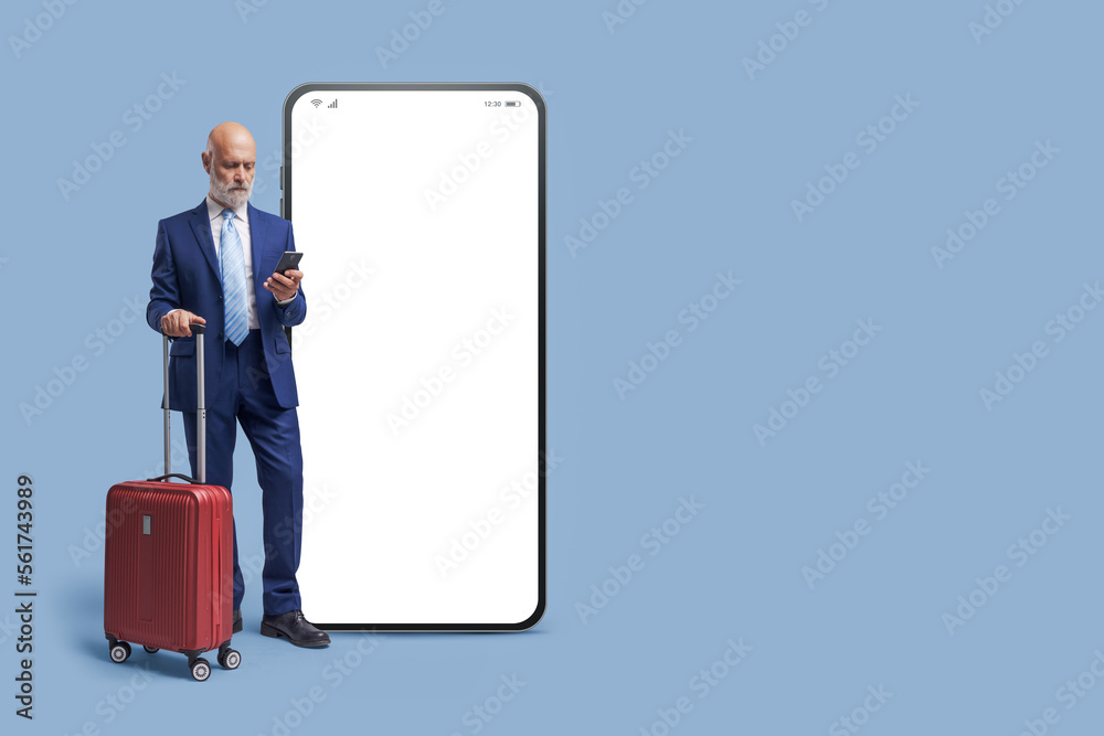 Businessman using travel apps on smartphone