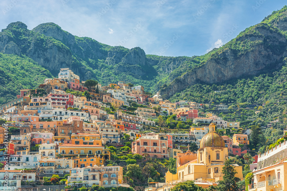 View of Positano town with colorful buildings and church of Our Lady of the Assumption on Amalfi coast, Campania, Italy