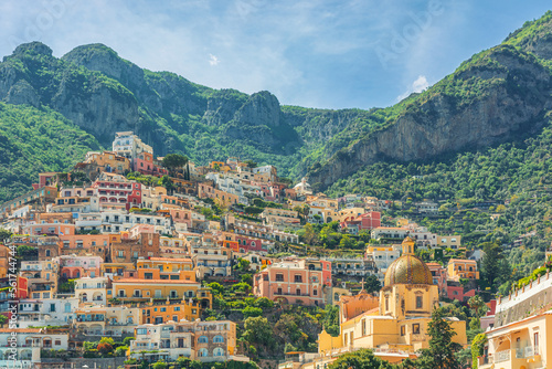 View of Positano town with colorful buildings and church of Our Lady of the Assumption on Amalfi coast, Campania, Italy