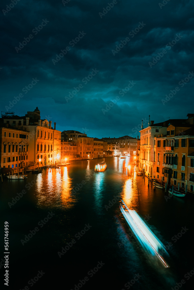 Grand Canal of Venice at night with boat trails, long exposure