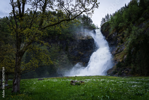 Huldefossen waterfall in Norway fed by melting water in spring