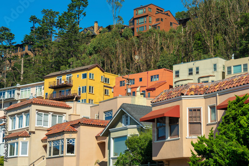 Canvas Print Cluster of colorful houses red beige green brown and red in historic districts i
