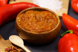 Balkan sauce ajvar and ingredients for its preparation. Serbian traditional food.