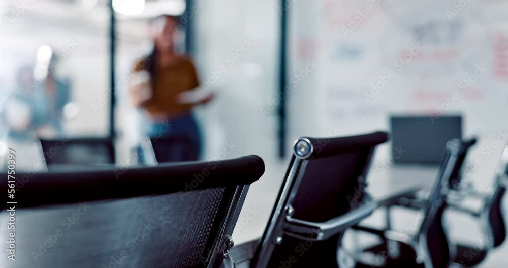 Office, meeting and business people walking into boardroom together. Company, teamwork and group of employees, workers or staff sitting down on chairs in corporate workplace for strategy planning.