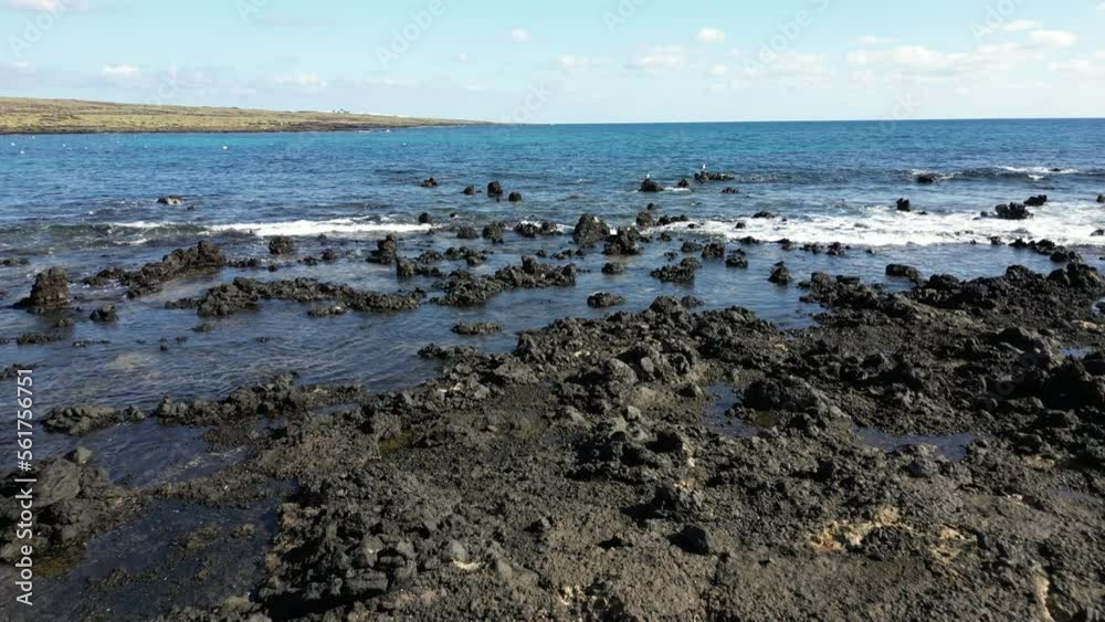 Drone aerial view of the waves of the stormy sea ocean break at the shores on the coast of black lava rocks of volcanic origin in Lanzarote Canary Islands - sea level rise and climate change Drone aerial view of the waves of the stormy sea ocean break at the shores on the coast of black lava rocks of volcanic origin in Lanzarote Canary Islands - sea level rise and climate change