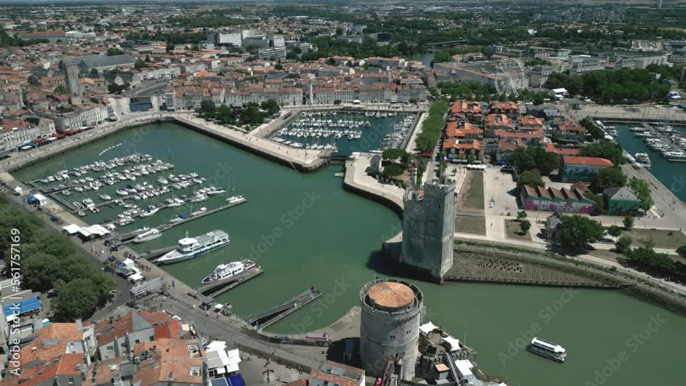 La Rochelle old port with Chain and Saint Nicolas Tower, Charente Maritime in France. Aerial drone
