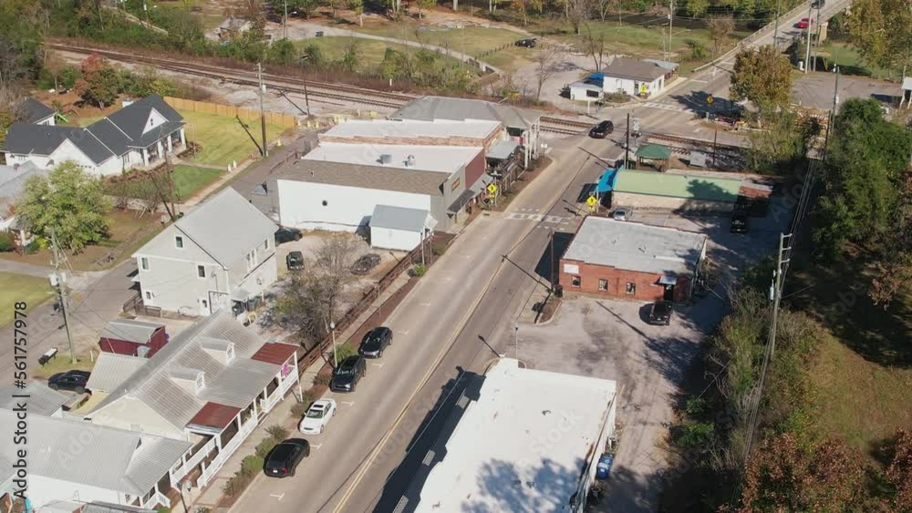 Aerial pass over shops and railroad tracks in Old Town Helena, Alabama Aerial pass over shops and railroad tracks in Old Town Helena, Alabama