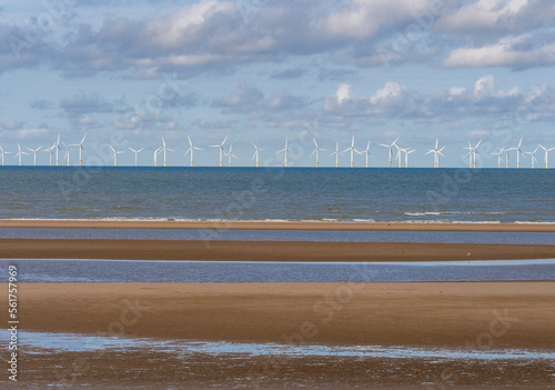 Wind Farm and Sand Patterns on a Welsh Beach, Rhyl, Wales, UK photo