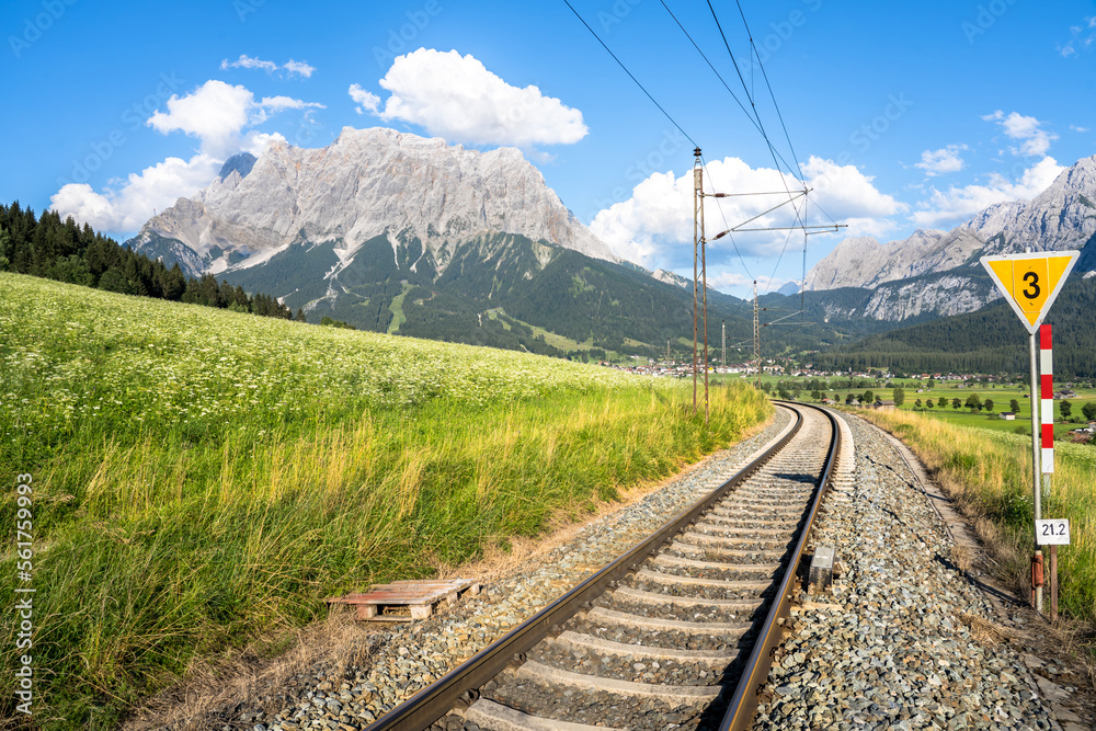 Fototapeta premium Railway with Mountain Zugspitze in the background, Ehrwald, Germany