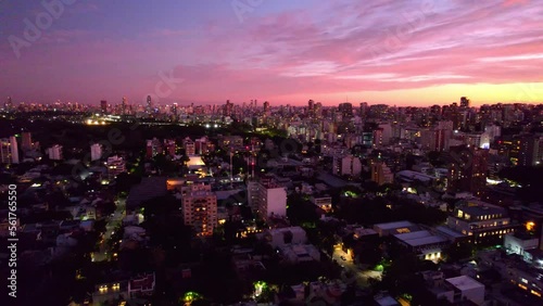 Aerial view establishing the Núñez neighborhood, wealthy neighborhood of the Argentine capital, epic sunset with clouds. photo