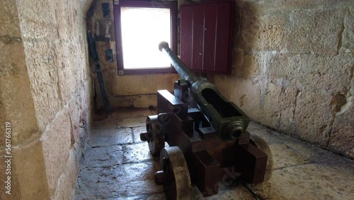 Ancient Cannon Inside Belem Tower Facing On Embrasure In The Fort Wall In Lisbon, Portugal. Handheld