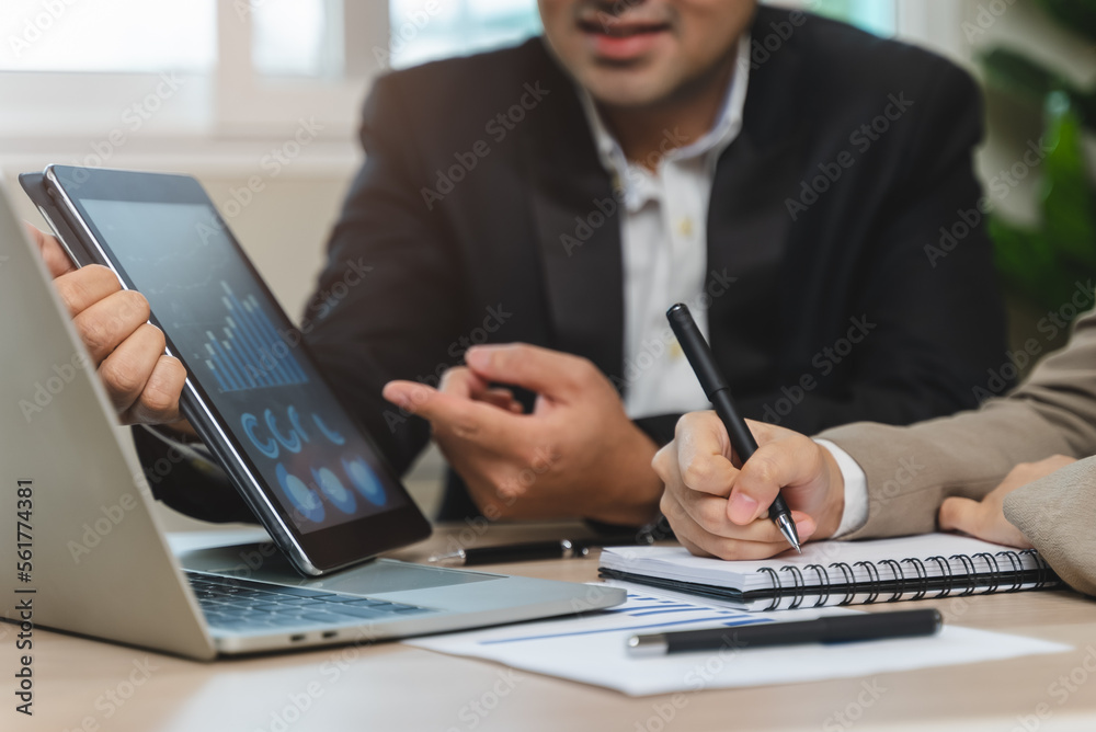 financial advisory services. Asian advisor showing plan of investment to clients in the consultancy office financial advisory services. Asian advisor showing plan of investment to clients in the consultancy office