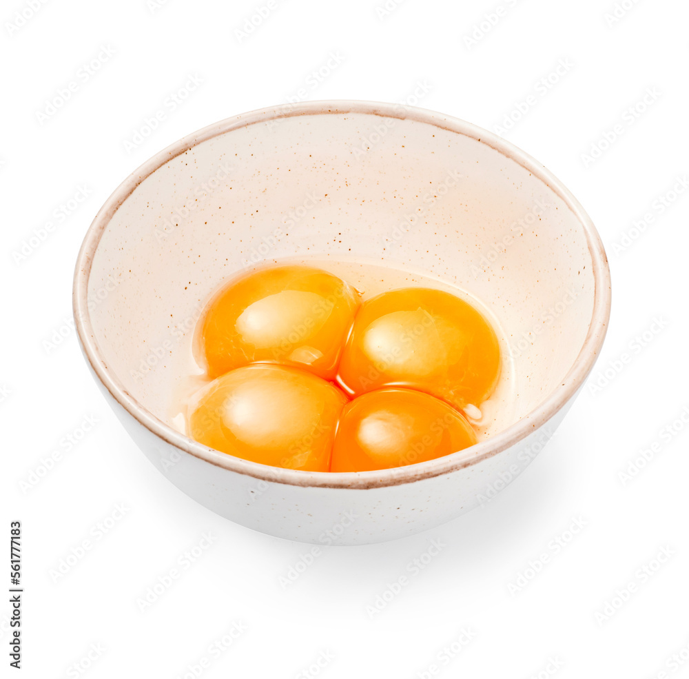 Bowl with egg yolks isolated. Three yolks in white bowl. Bowl with egg yolks isolated. Three yolks in white bowl.
