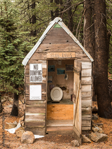 Classic old outhouse photo